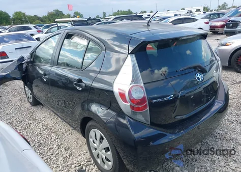 2014 Toyota Prius C Two z USA, uszkodzony, nr VIN JTDKDTB36E1570236